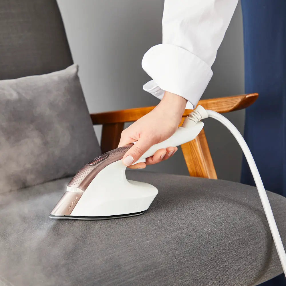 جهاز متكامل للكي بالبخار والكي العادي، مع لوح كي متعدد الأوضاع.